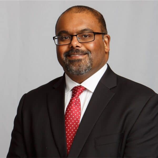 Headshot of Anil “Neil” Chacko, CFP®, CKA®