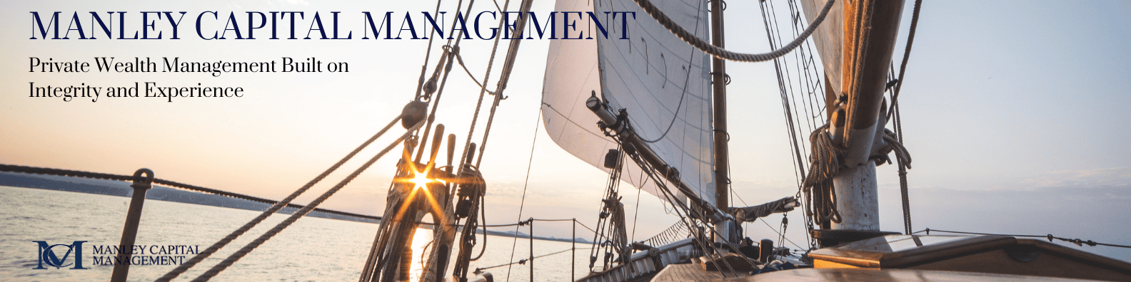 A sailboat on the water at sunset with 